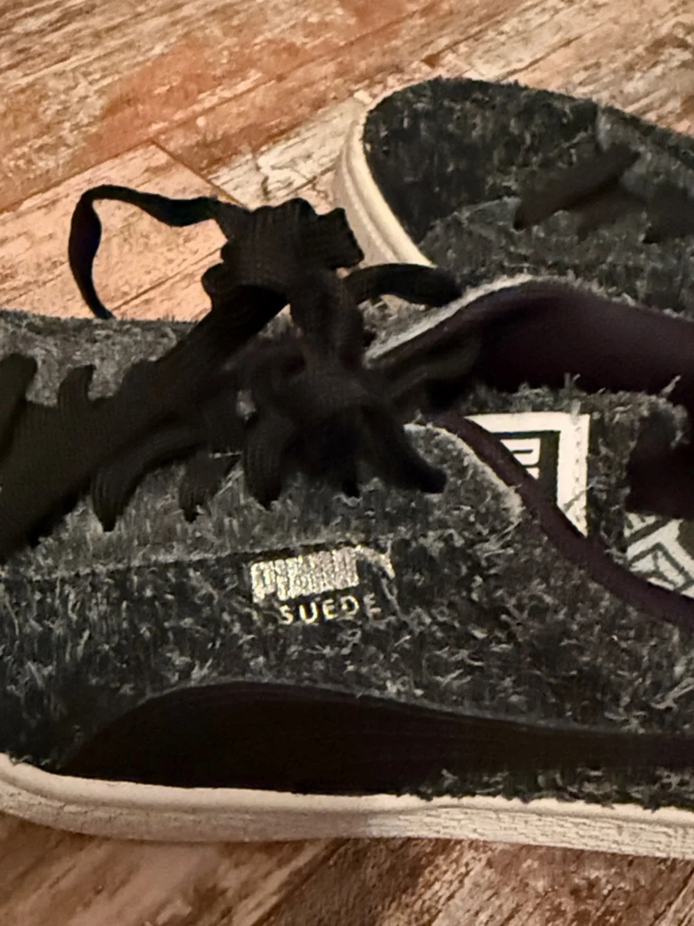 Puma Black Fuzzy Low-Top Sneakers with White Sole